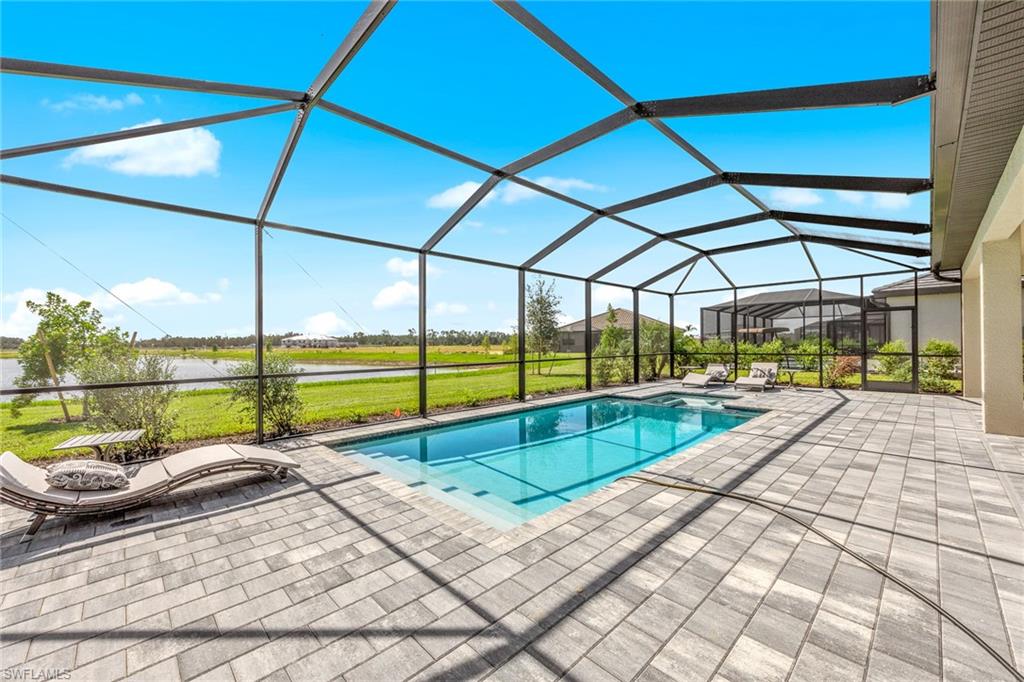 14351 Lagoon Lane Babcock Ranch, FL 33982 - Photo 36 of 39 a view of a swimming pool with a porch