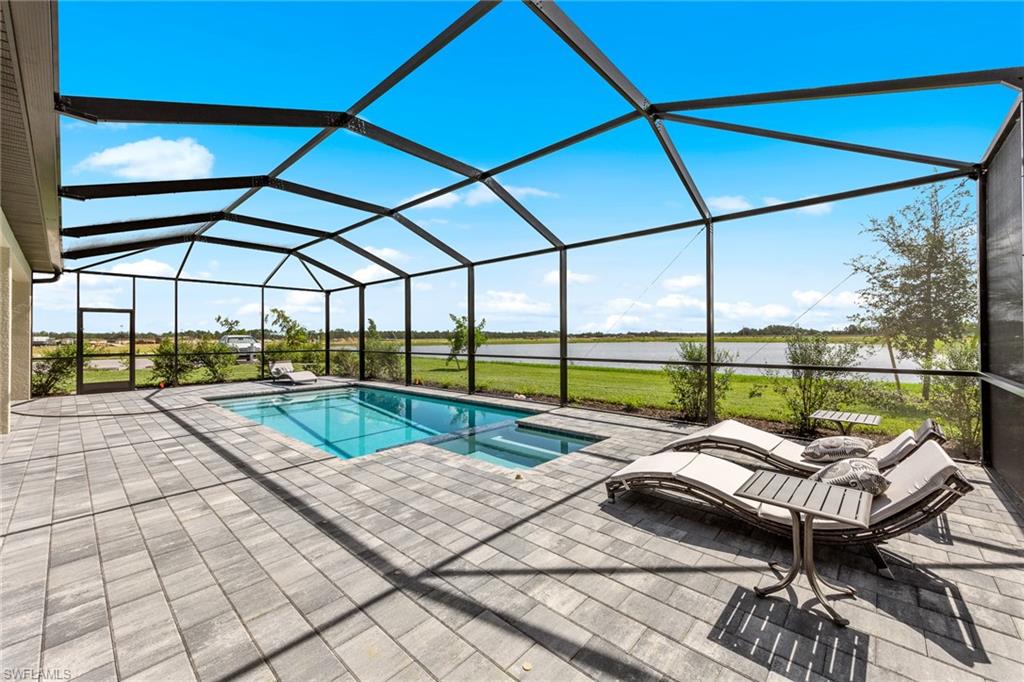14351 Lagoon Lane Babcock Ranch, FL 33982 - Photo 37 of 39 a balcony with furniture and view of outdoor space