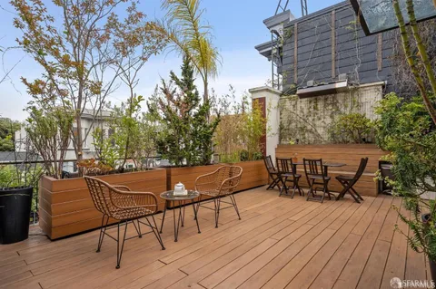 a view of a outdoor seating area with furniture