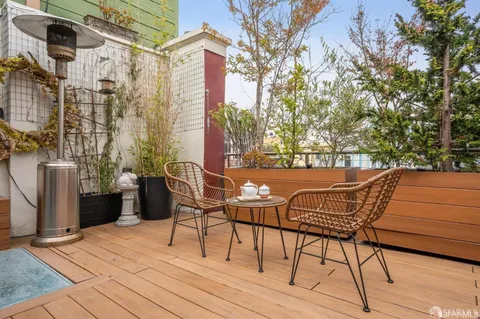 a view of a terrace with furniture