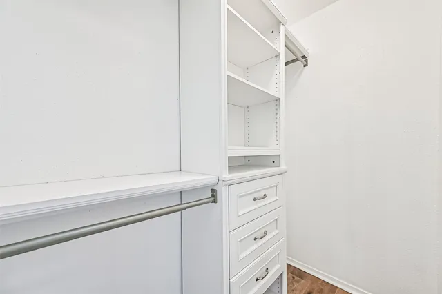 a close view of closet and racks