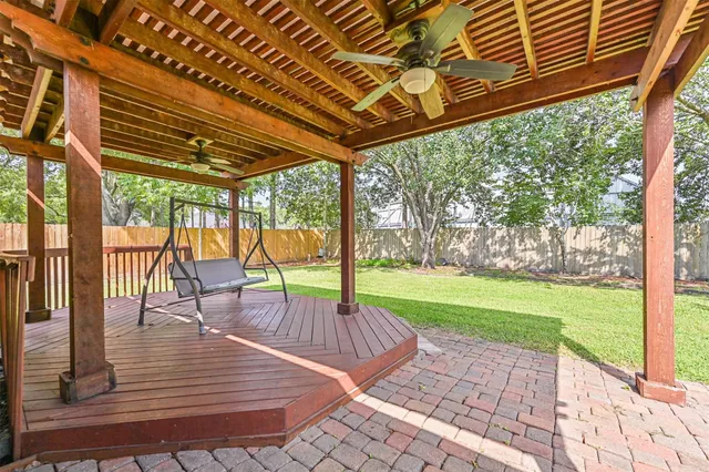 a view of a swimming pool with a porch