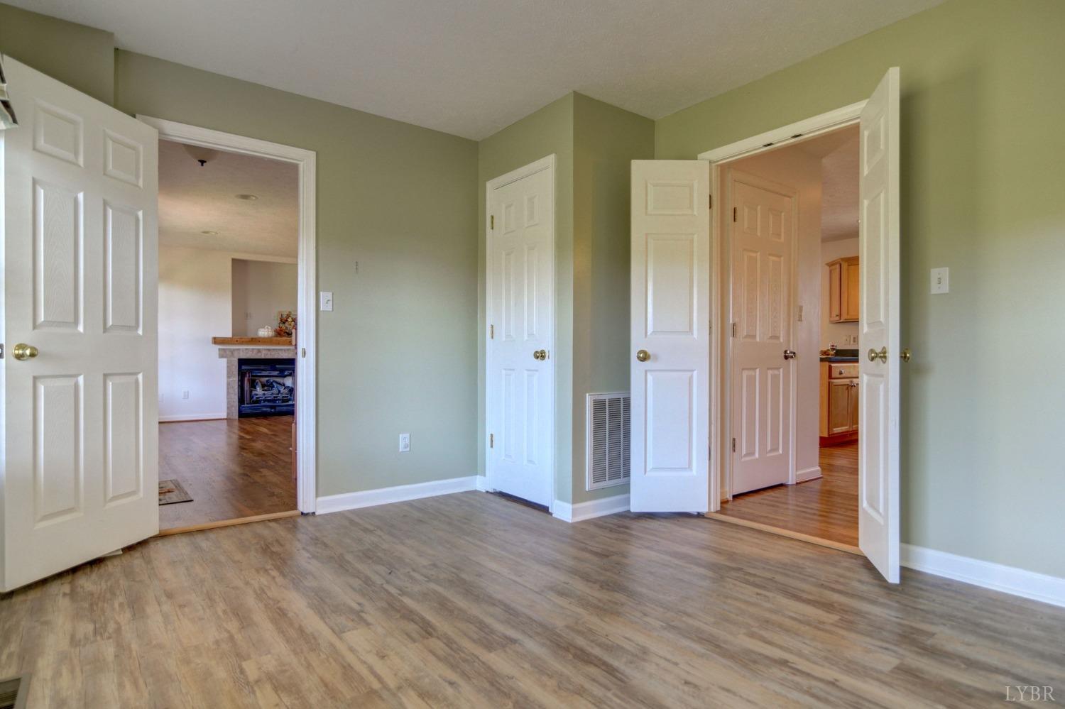3636 White Road Forest, VA 24551 - Photo 19 of 44 an empty room with wooden floor and closet