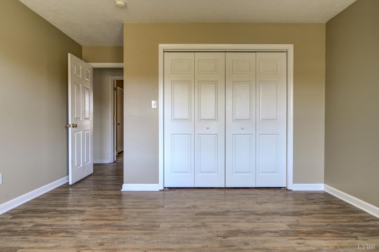 3636 White Road Forest, VA 24551 - Photo 30 of 44 a view of an empty room with wooden floor