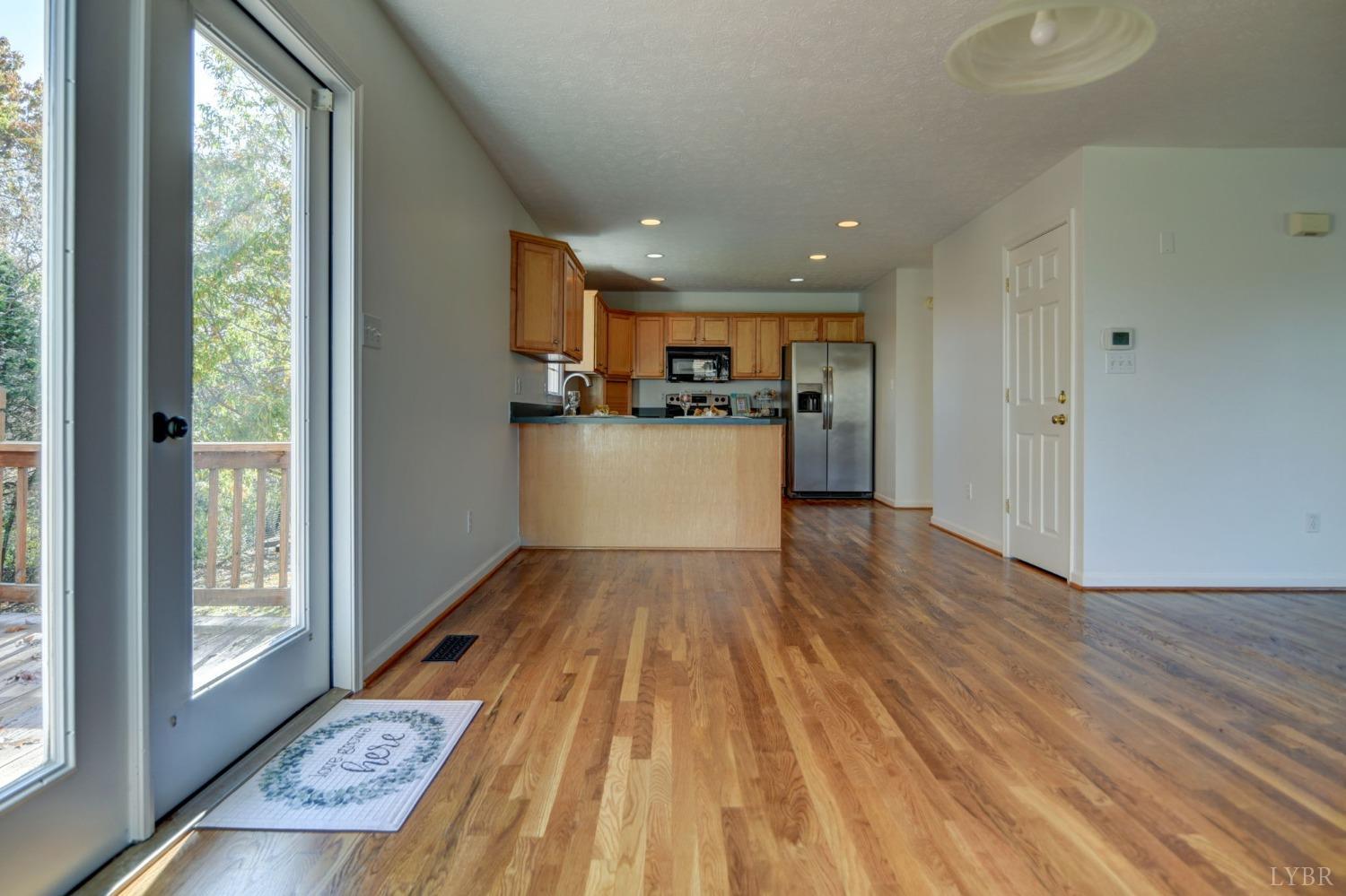 3636 White Road Forest, VA 24551 - Photo 10 of 44 a kitchen with a wooden floor and a view of kitchen