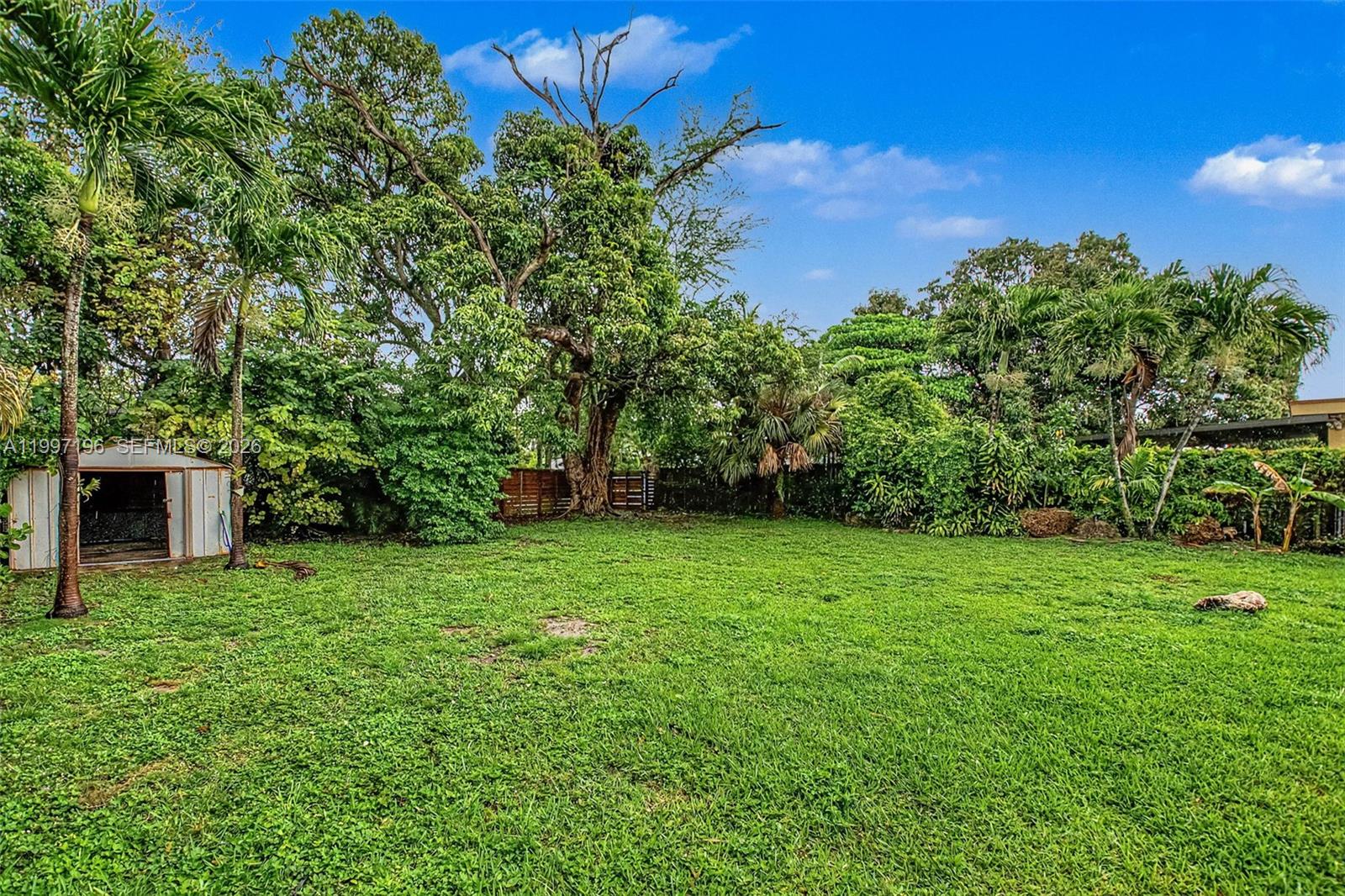 3951 Southwest 2nd Terrace Miami, FL 33134 - Photo 15 of 32 a view of a backyard with a garden