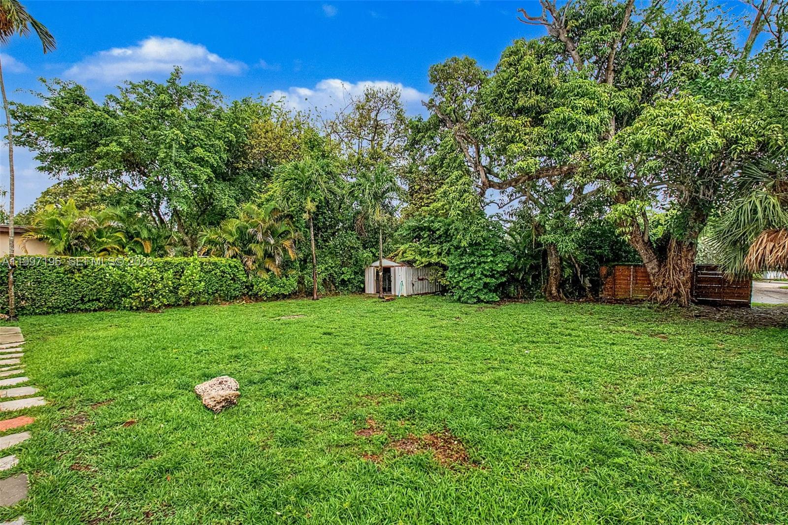 3951 Southwest 2nd Terrace Miami, FL 33134 - Photo 16 of 32 a green field with lots of bushes
