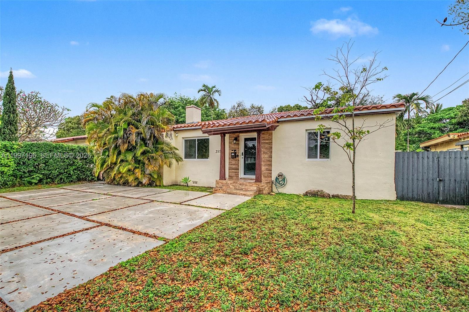 3951 Southwest 2nd Terrace Miami, FL 33134 - Photo 2 of 32 a view of a house with a yard
