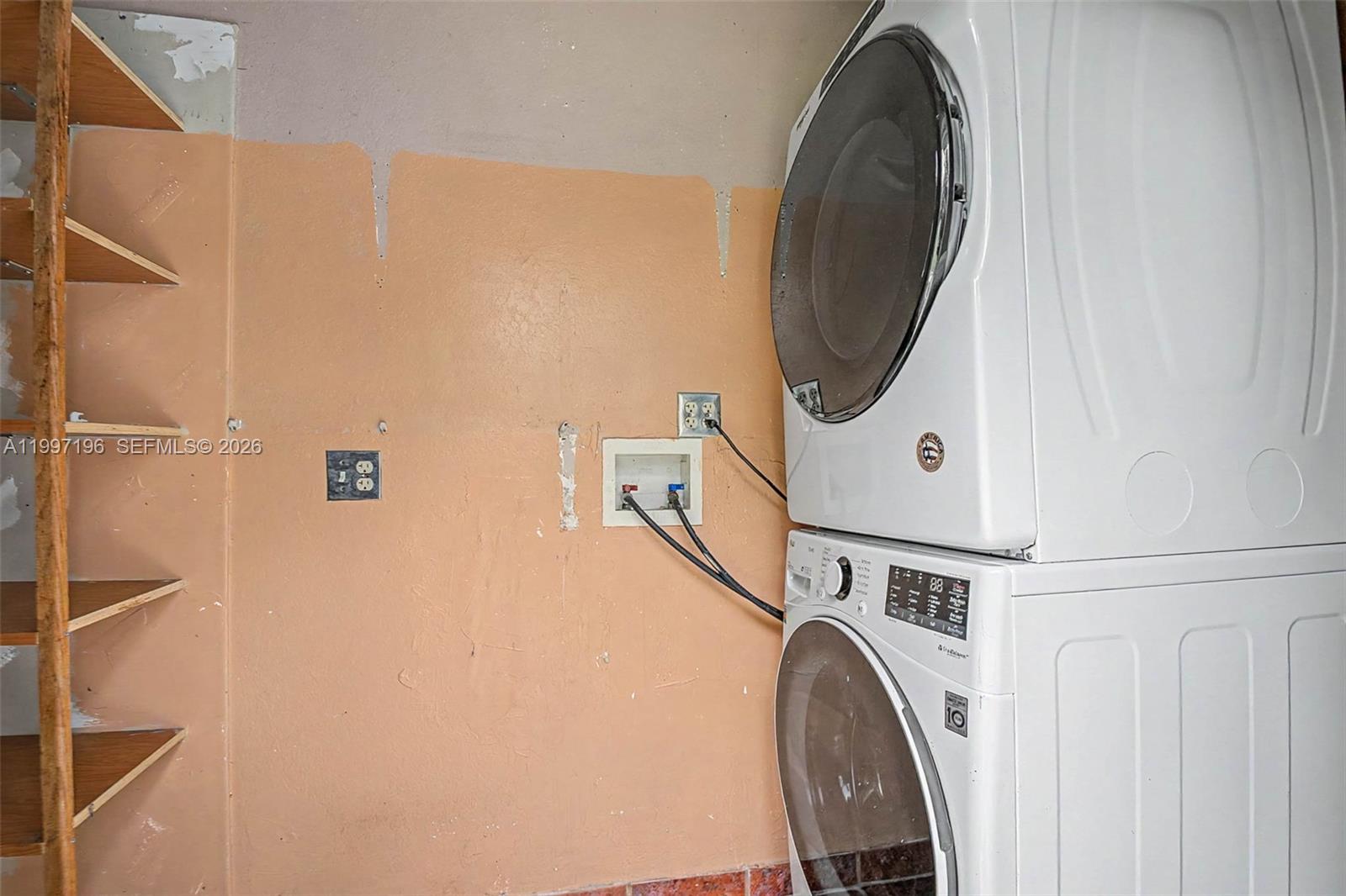 3951 Southwest 2nd Terrace Miami, FL 33134 - Photo 25 of 32 a utility room with dryer and washer