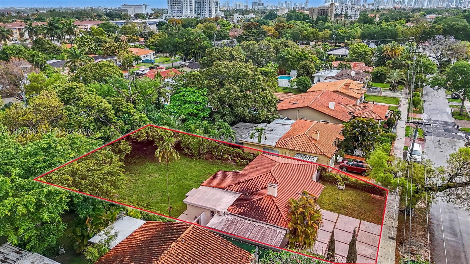 3951 Southwest 2nd Terrace Miami, FL 33134 - Photo 31 of 32 an aerial view of a house with a garden and swimming pool