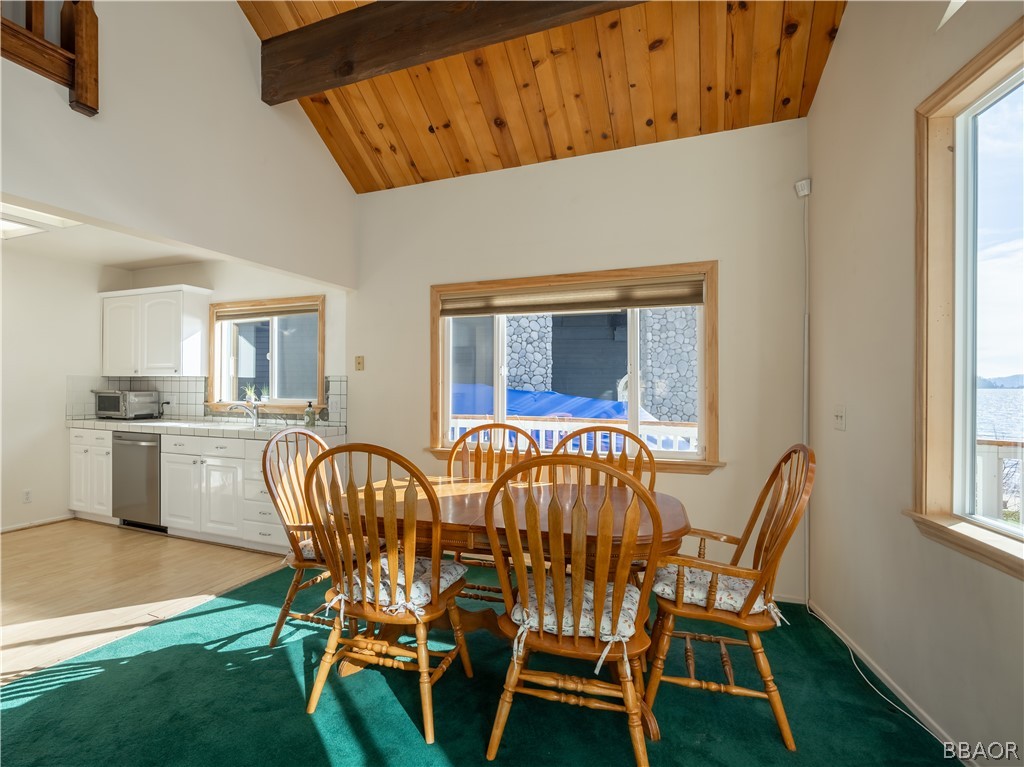 136 Round Drive Big Bear Lake, CA 92315 - Photo 11 of 45 a view of a dining room with furniture and window