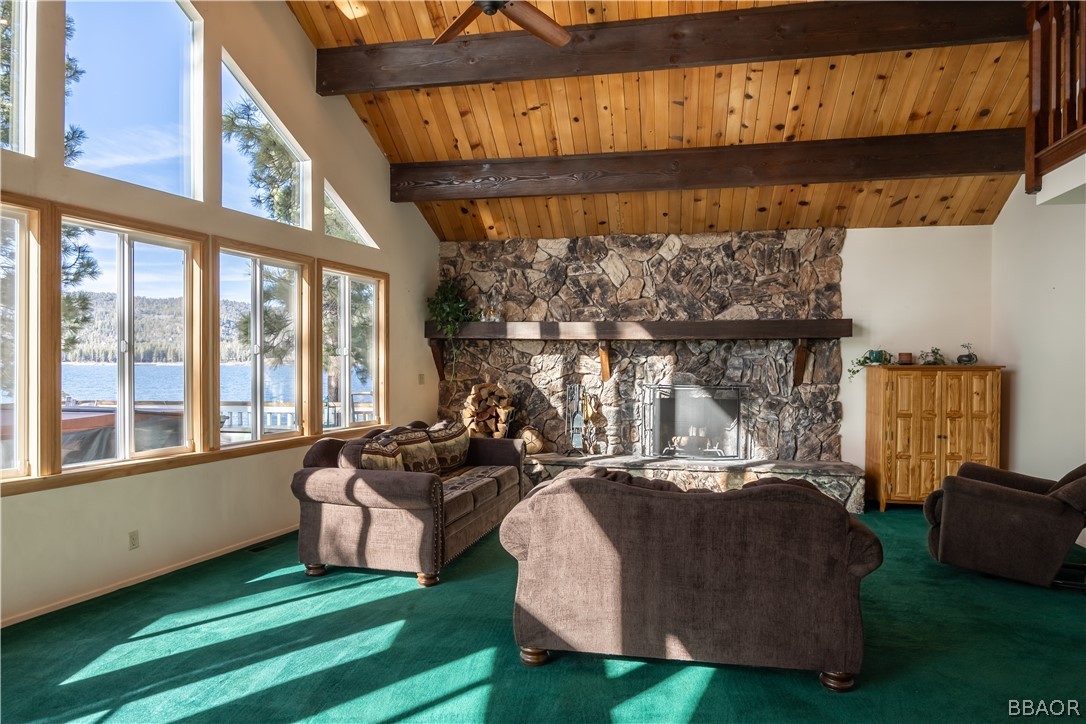 136 Round Drive Big Bear Lake, CA 92315 - Photo 23 of 45 a living room with furniture a window and gym equipment