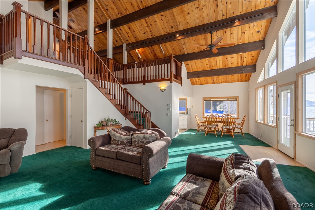 136 Round Drive Big Bear Lake, CA 92315 - Photo 9 of 45 a backyard of a house with table and sofas