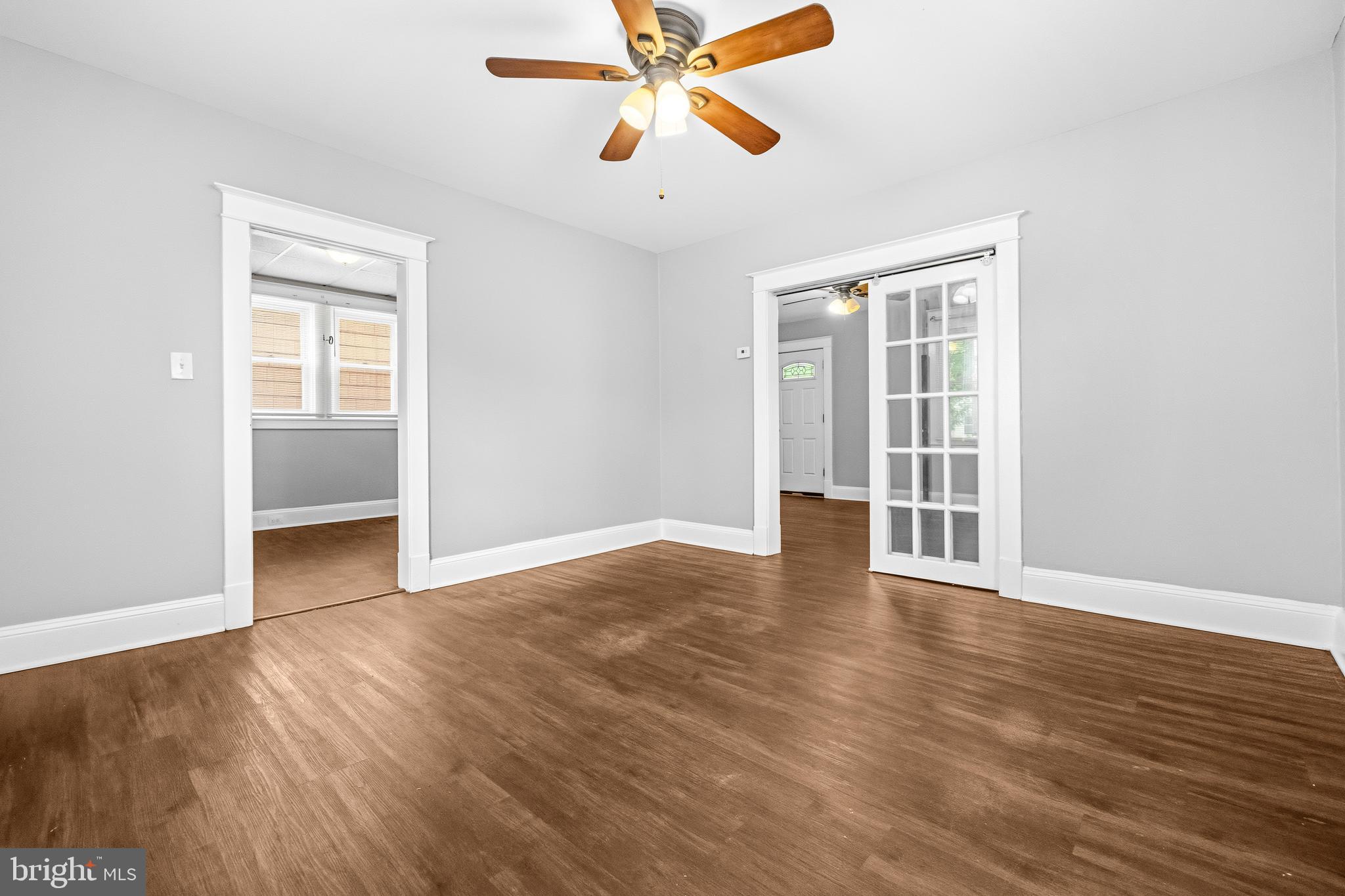 12 Leeway Dundalk, MD 21222 - Photo 11 of 34 a view of an empty room with window and wooden floor
