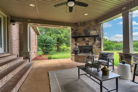 a view of a building with yard