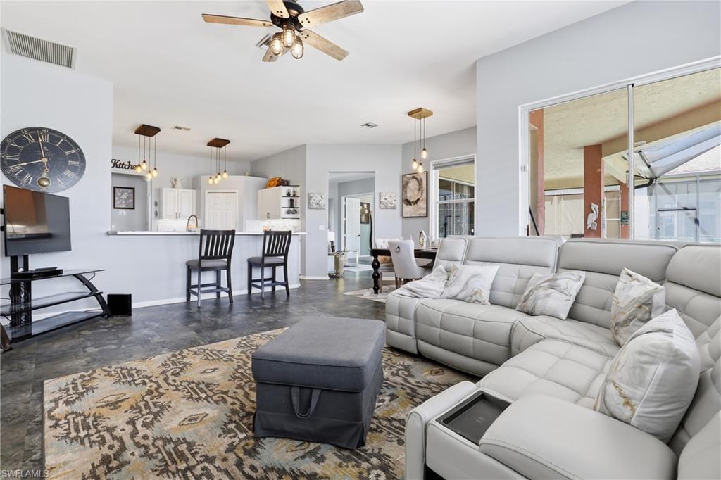 3236 Potomac Court Naples, FL 34120 - Photo 13 of 47 a living room with furniture