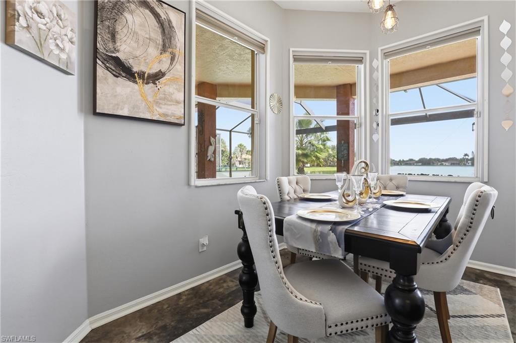 3236 Potomac Court Naples, FL 34120 - Photo 15 of 47 a dining room with furniture and window