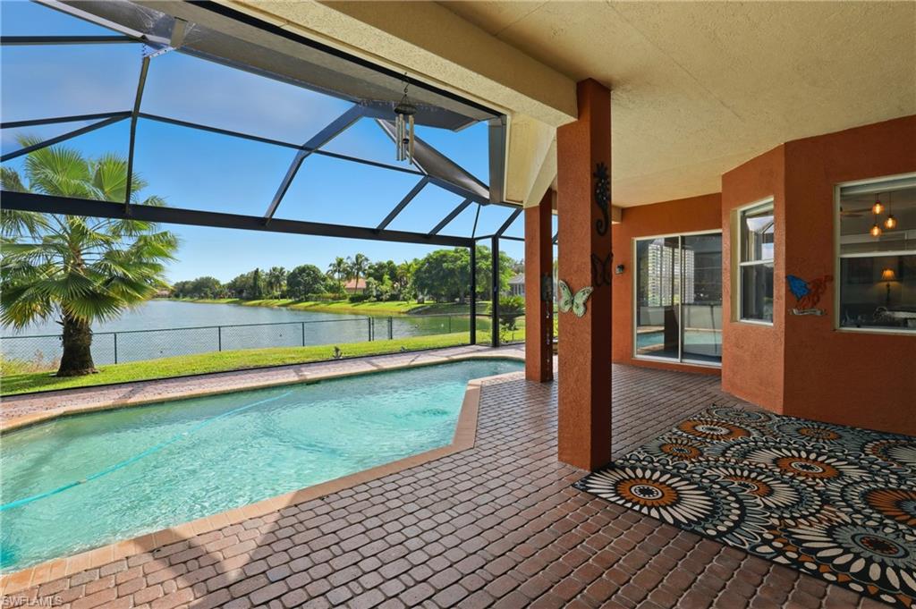 3236 Potomac Court Naples, FL 34120 - Photo 37 of 47 a view of a porch with a garden