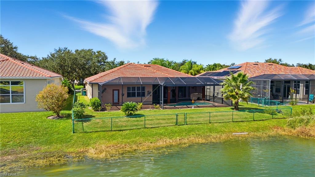 3236 Potomac Court Naples, FL 34120 - Photo 45 of 47 a house with swimming pool in front of it