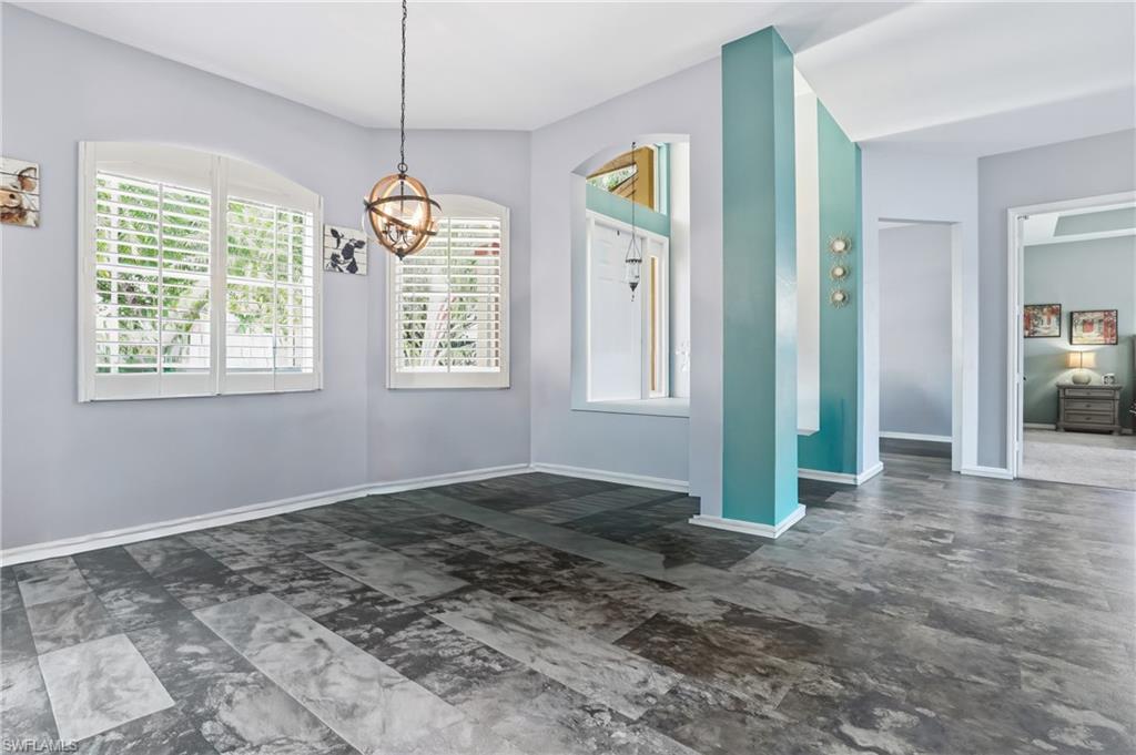 3236 Potomac Court Naples, FL 34120 - Photo 9 of 47 an empty room with windows and closet