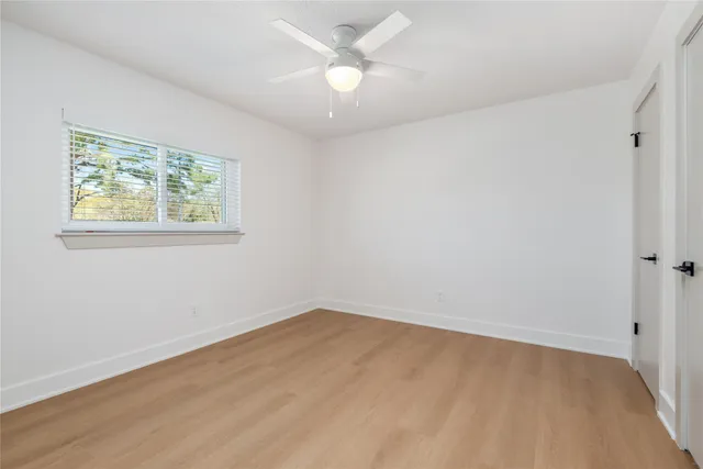 a bathroom with a double vanity sink mirror and double