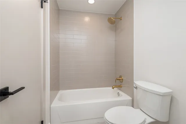 a front view of a house with a yard and porch