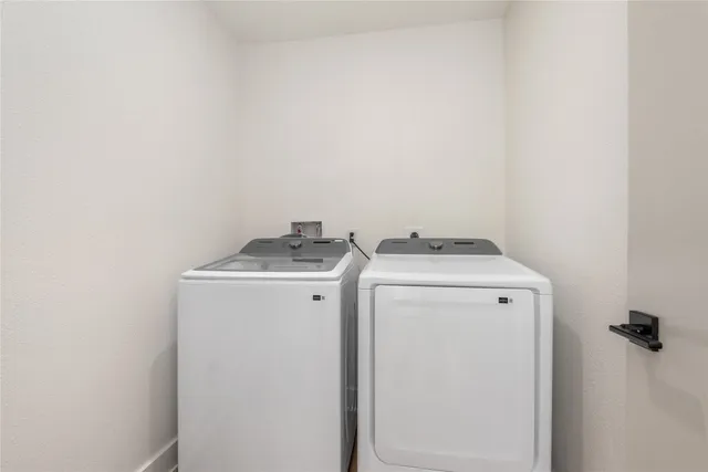 a front view of house with yard and outdoor seating