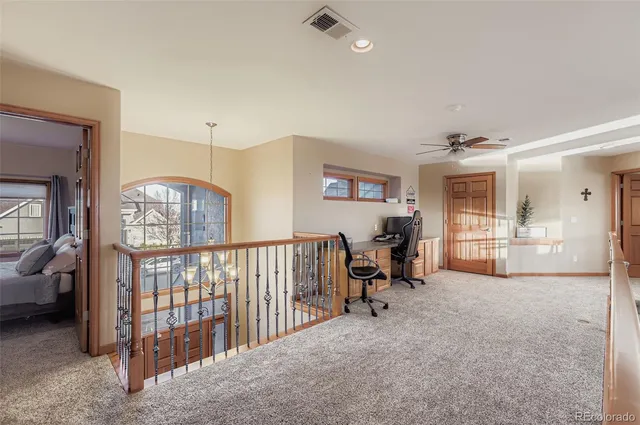 a view of livingroom with furniture and a window