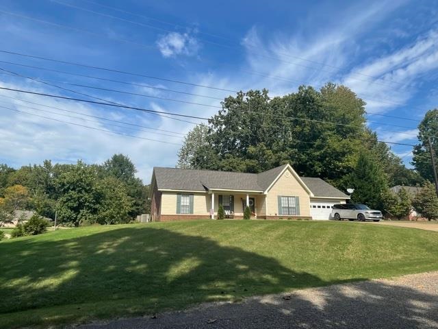a view of house with outdoor space