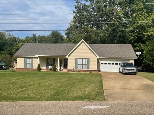 1010 Harmon Drive Atoka, TN 38004 - Photo 2 of 20 a house view with a garden space