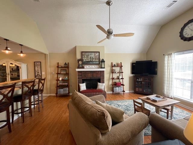 1010 Harmon Drive Atoka, TN 38004 - Photo 11 of 20 a living room with furniture a flat screen tv and a fireplace