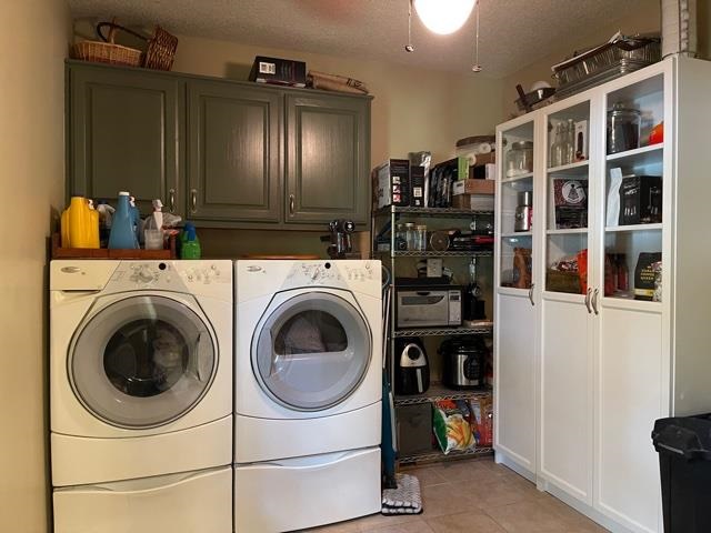 1010 Harmon Drive Atoka, TN 38004 - Photo 12 of 20 a view of a storage and utility room with washer and dryer