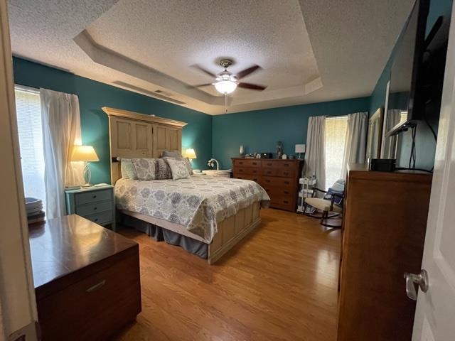 1010 Harmon Drive Atoka, TN 38004 - Photo 14 of 20 a bedroom with a bed window and a flat screen tv
