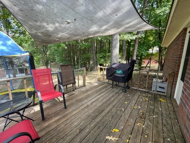 1010 Harmon Drive Atoka, TN 38004 - Photo 20 of 20 an outdoor sitting area with furniture and wooden floor