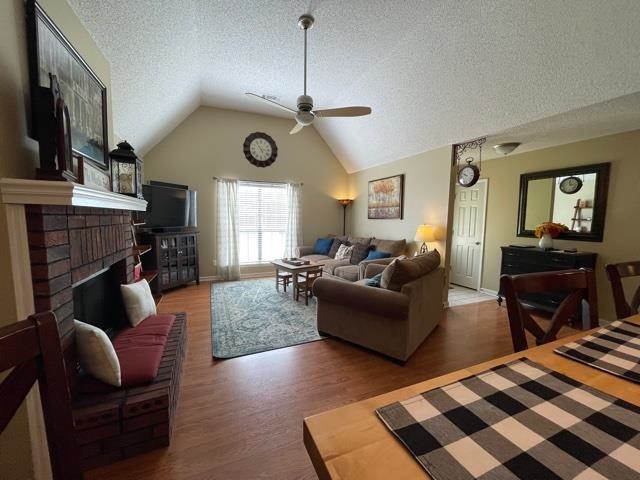 1010 Harmon Drive Atoka, TN 38004 - Photo 9 of 20 a living room with furniture a flat screen tv and a fireplace