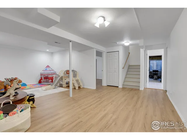 a view of a livingroom with wooden floor