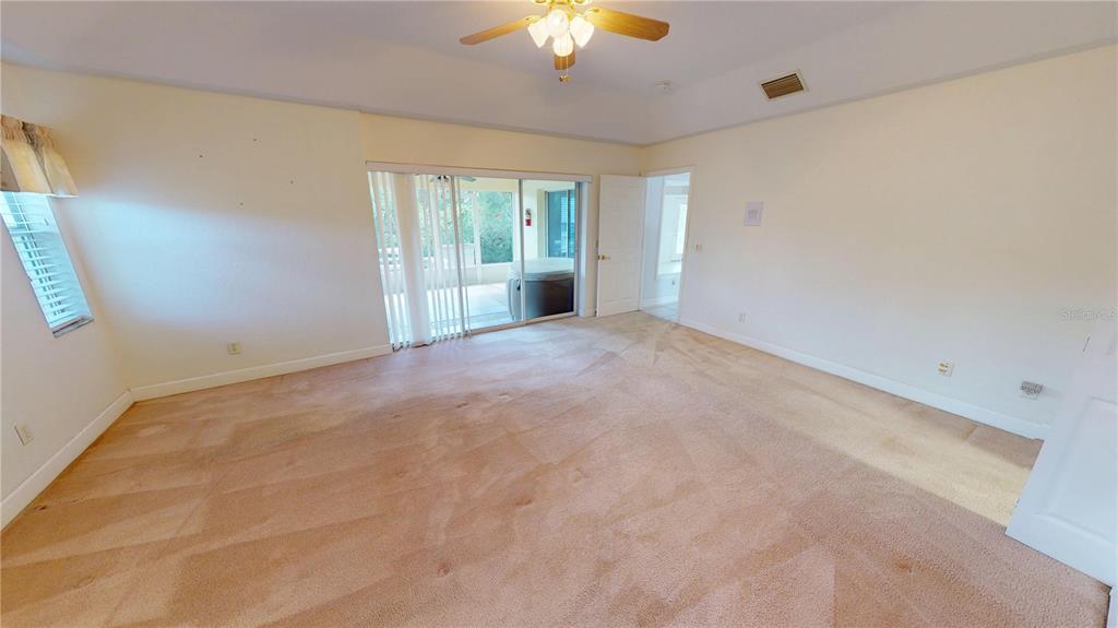 2244 Mauritania Road Punta Gorda, FL 33983 - Photo 14 of 46 a view of an empty room with a window