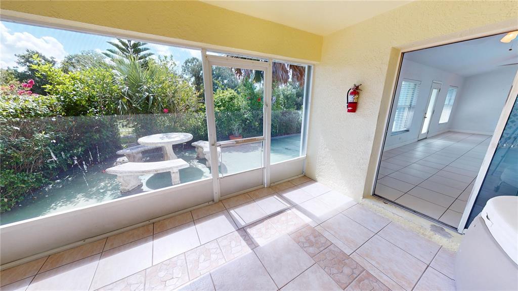 2244 Mauritania Road Punta Gorda, FL 33983 - Photo 17 of 46 a view of a chairs and table in the balcony