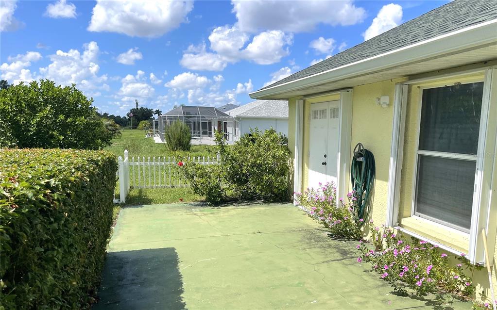 2244 Mauritania Road Punta Gorda, FL 33983 - Photo 42 of 46 a view of a pathway of house with potted plants