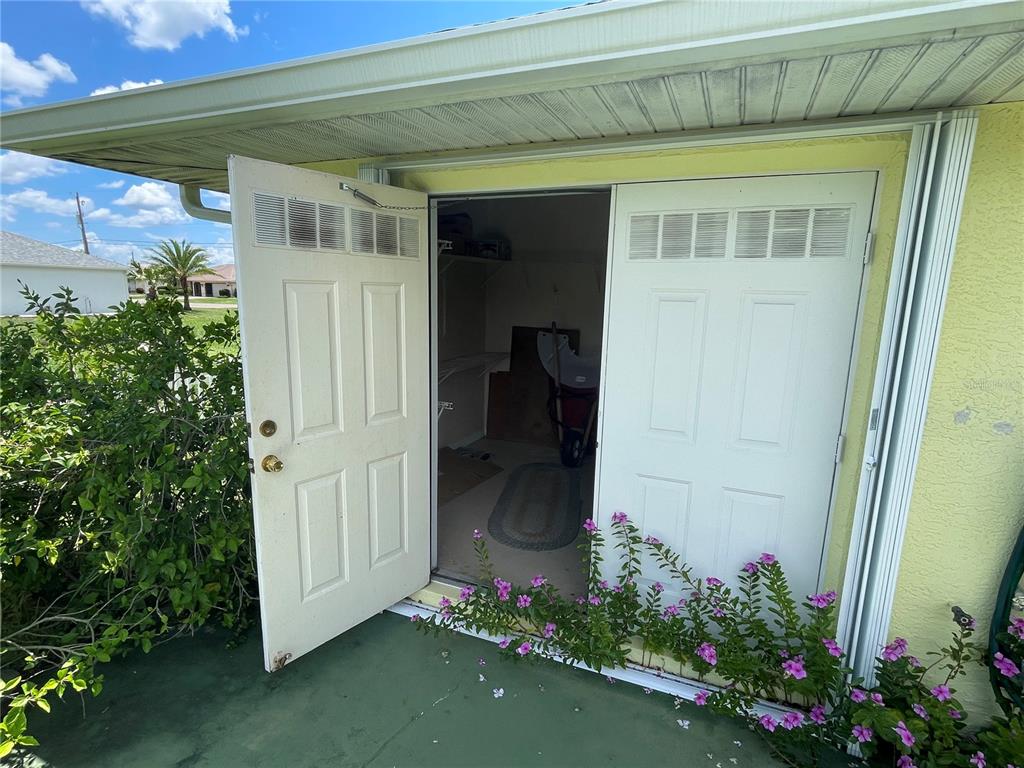 2244 Mauritania Road Punta Gorda, FL 33983 - Photo 44 of 46 a front view of a house with a yard