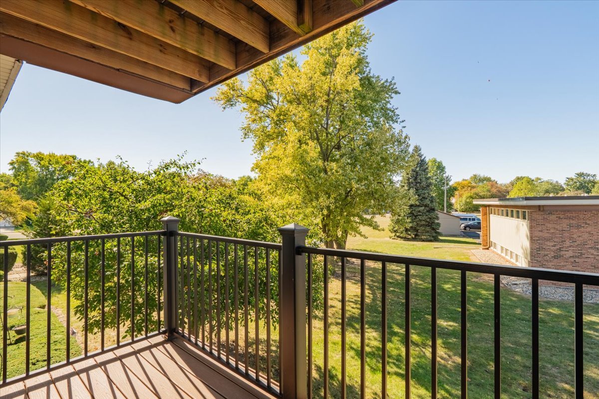 111 Rust Road, Unit 211 Bloomington, IL 61701 - Photo 14 of 15 a view of a balcony with outdoor space