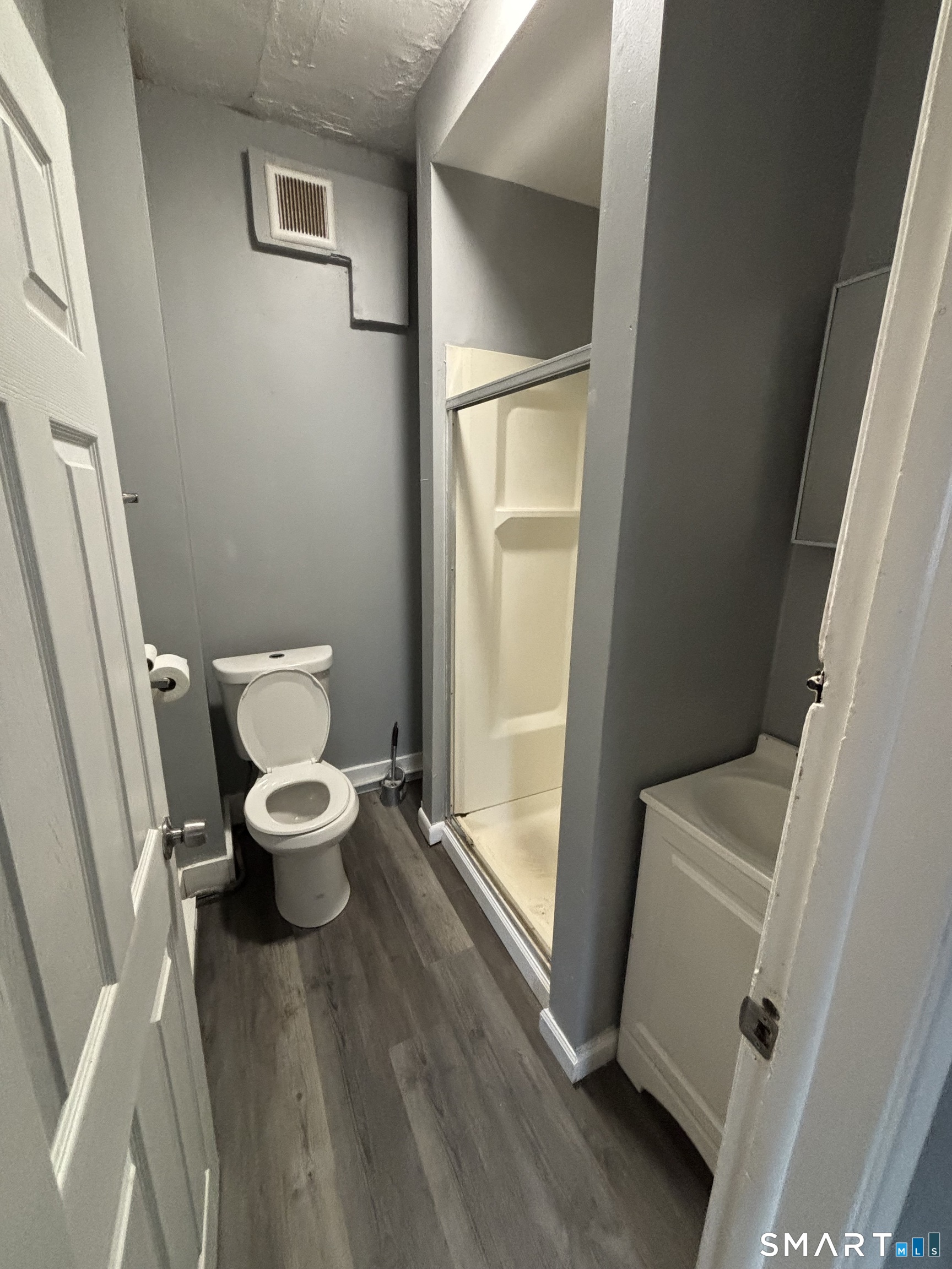2370 Main Street Hartford, CT 06120 - Photo 3 of 7 a bathroom with a toilet and a walk in closet