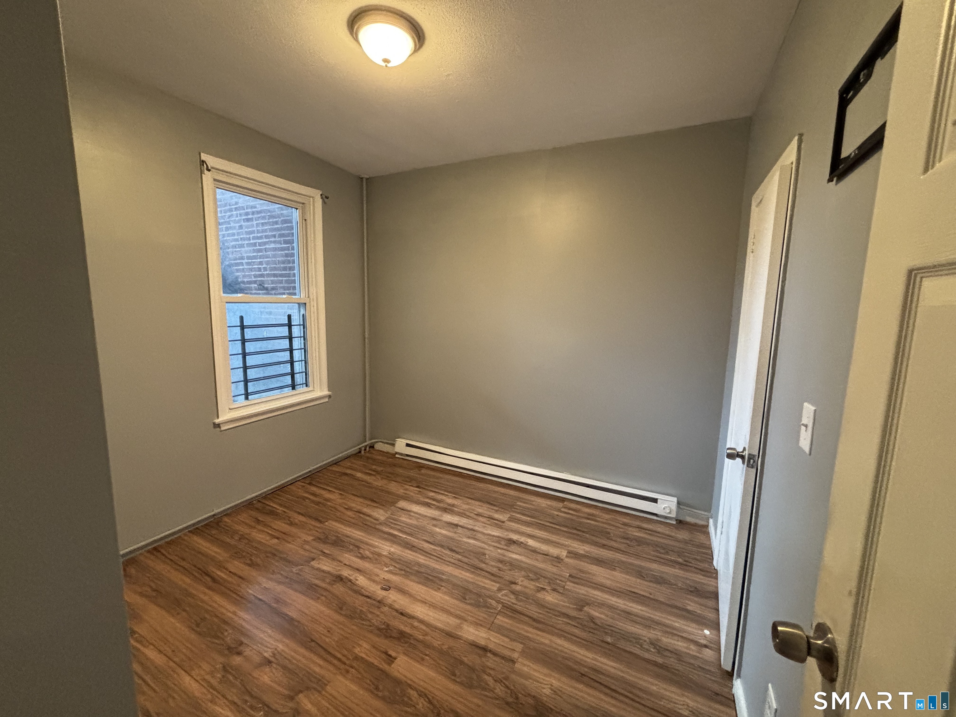 2370 Main Street Hartford, CT 06120 - Photo 4 of 7 an empty room with windows