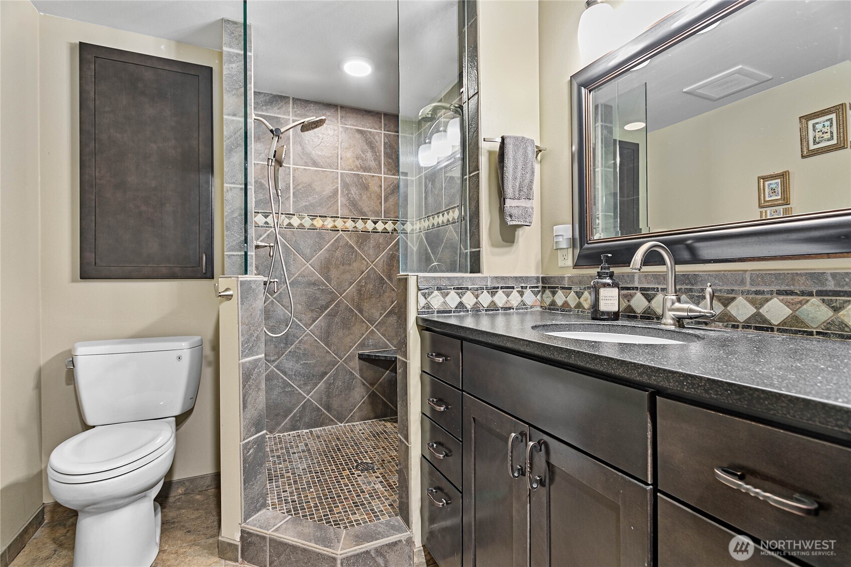 1082 West Smith Road Bellingham, WA 98226 - Photo 13 of 38 a bathroom with a sink toilet and shower