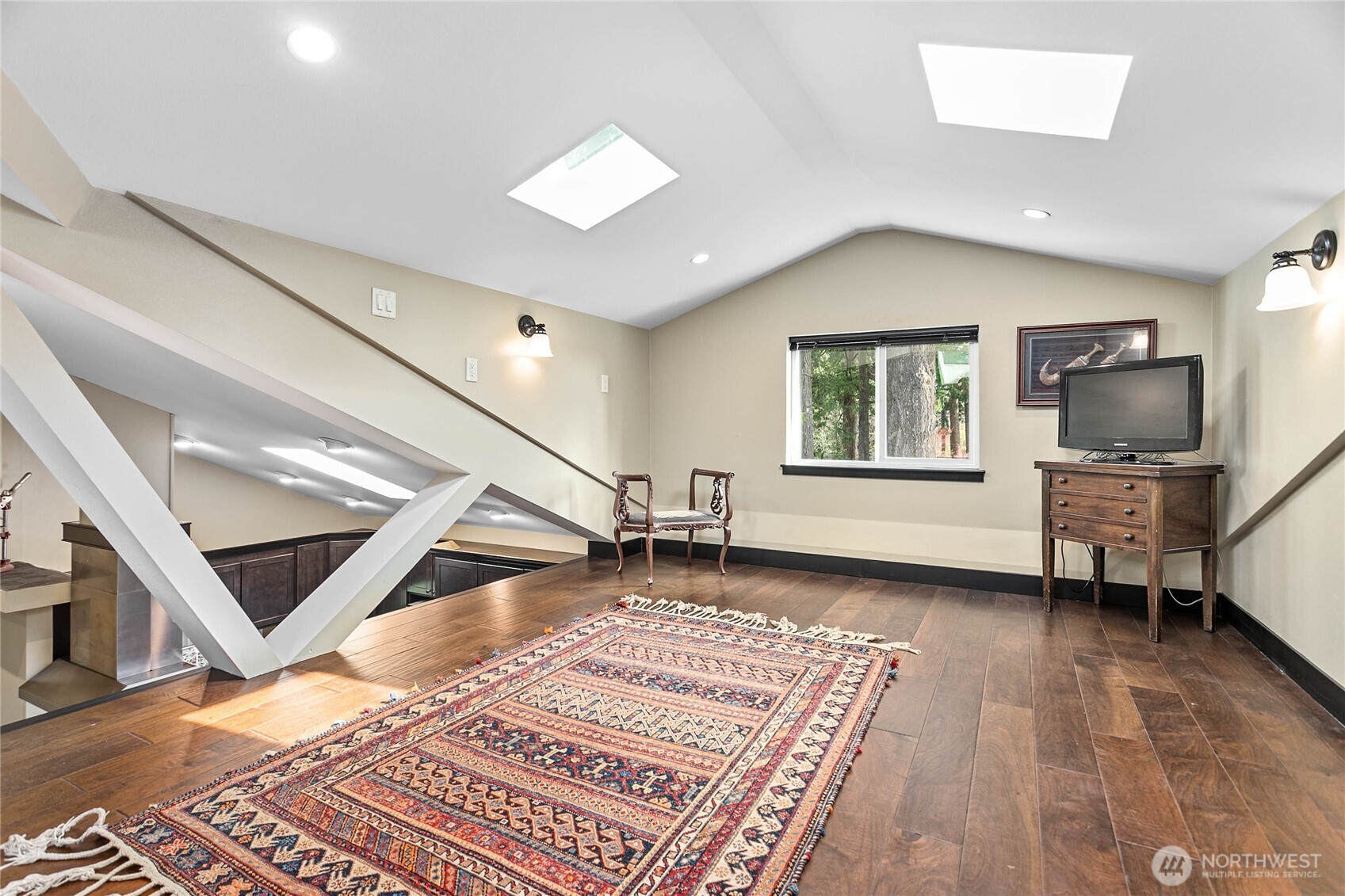 1082 West Smith Road Bellingham, WA 98226 - Photo 16 of 38 a living room with furniture and a rug