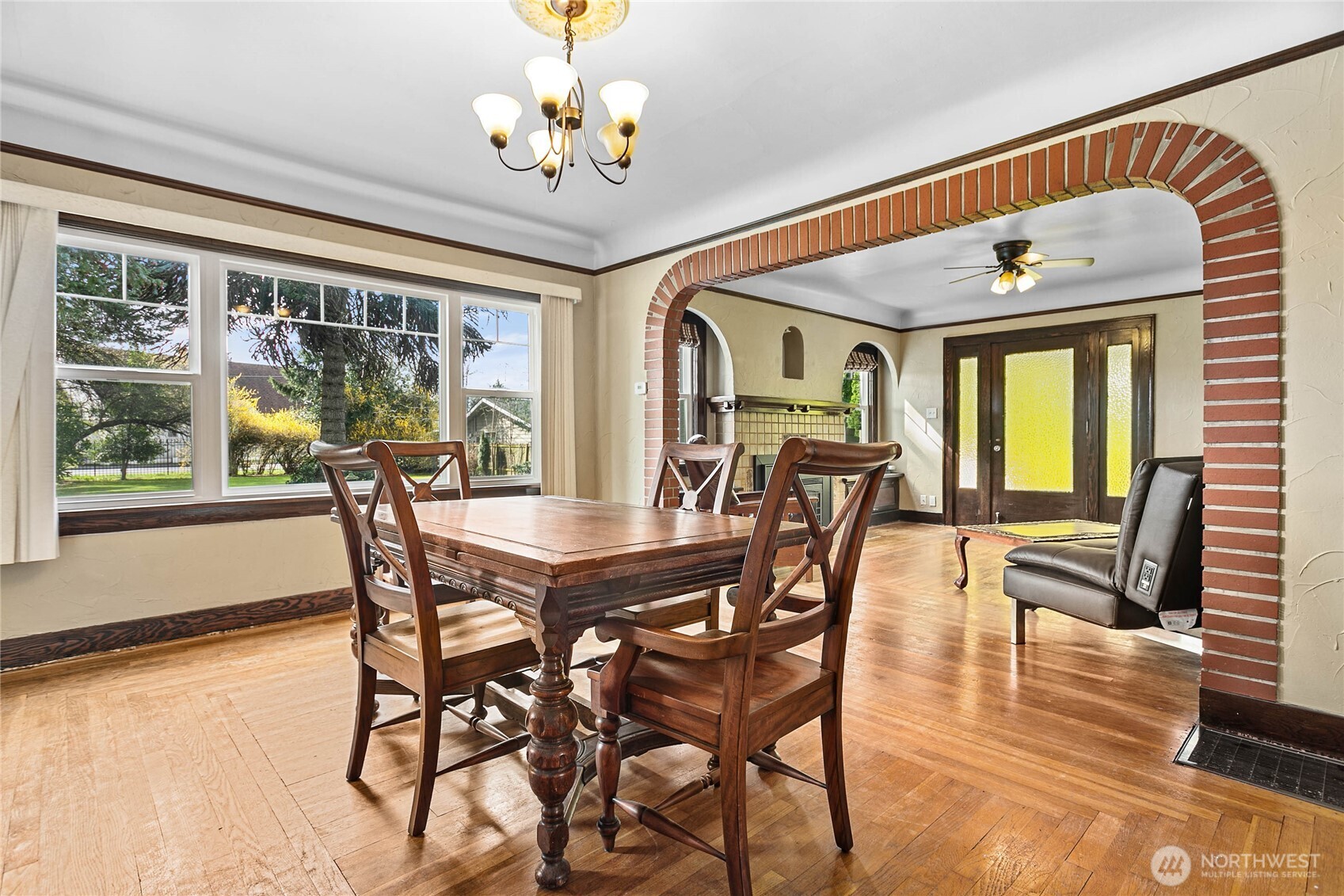 1082 West Smith Road Bellingham, WA 98226 - Photo 27 of 38 a view of a dining room with furniture a chandelier and wooden floor