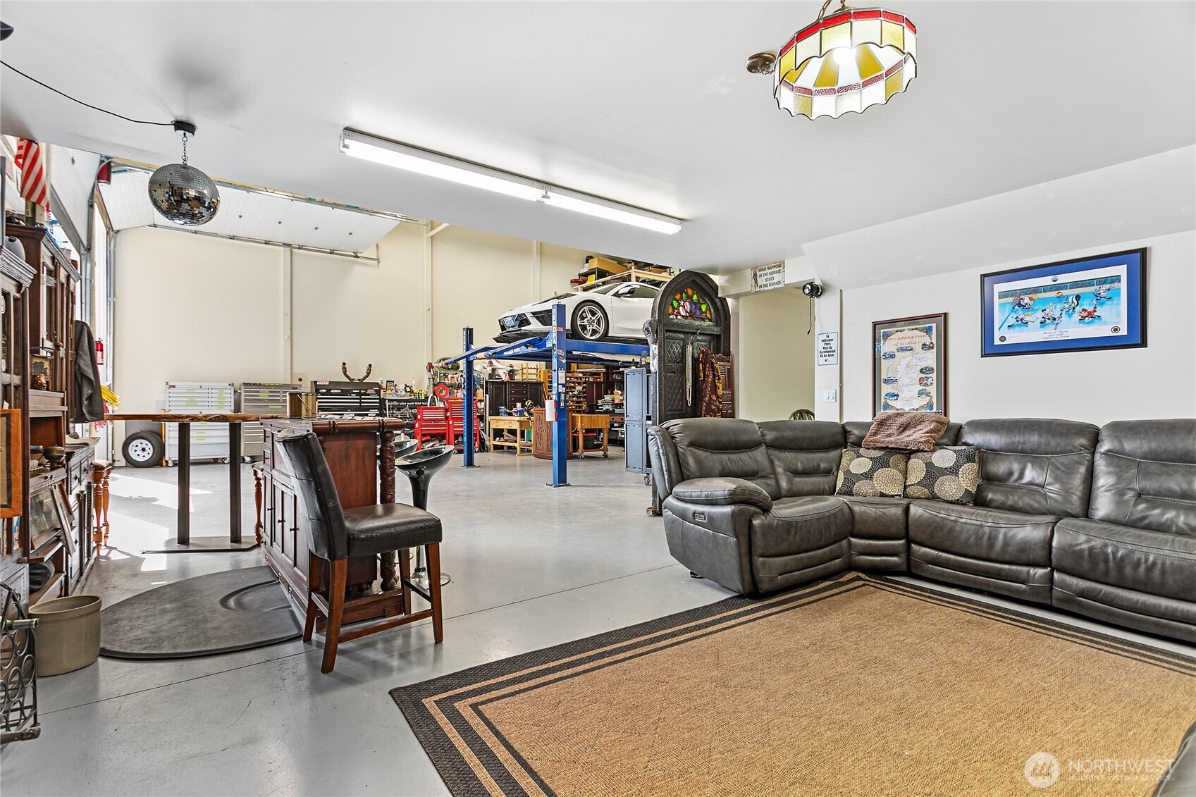 1082 West Smith Road Bellingham, WA 98226 - Photo 4 of 38 a living room with lots of furniture and a chandelier