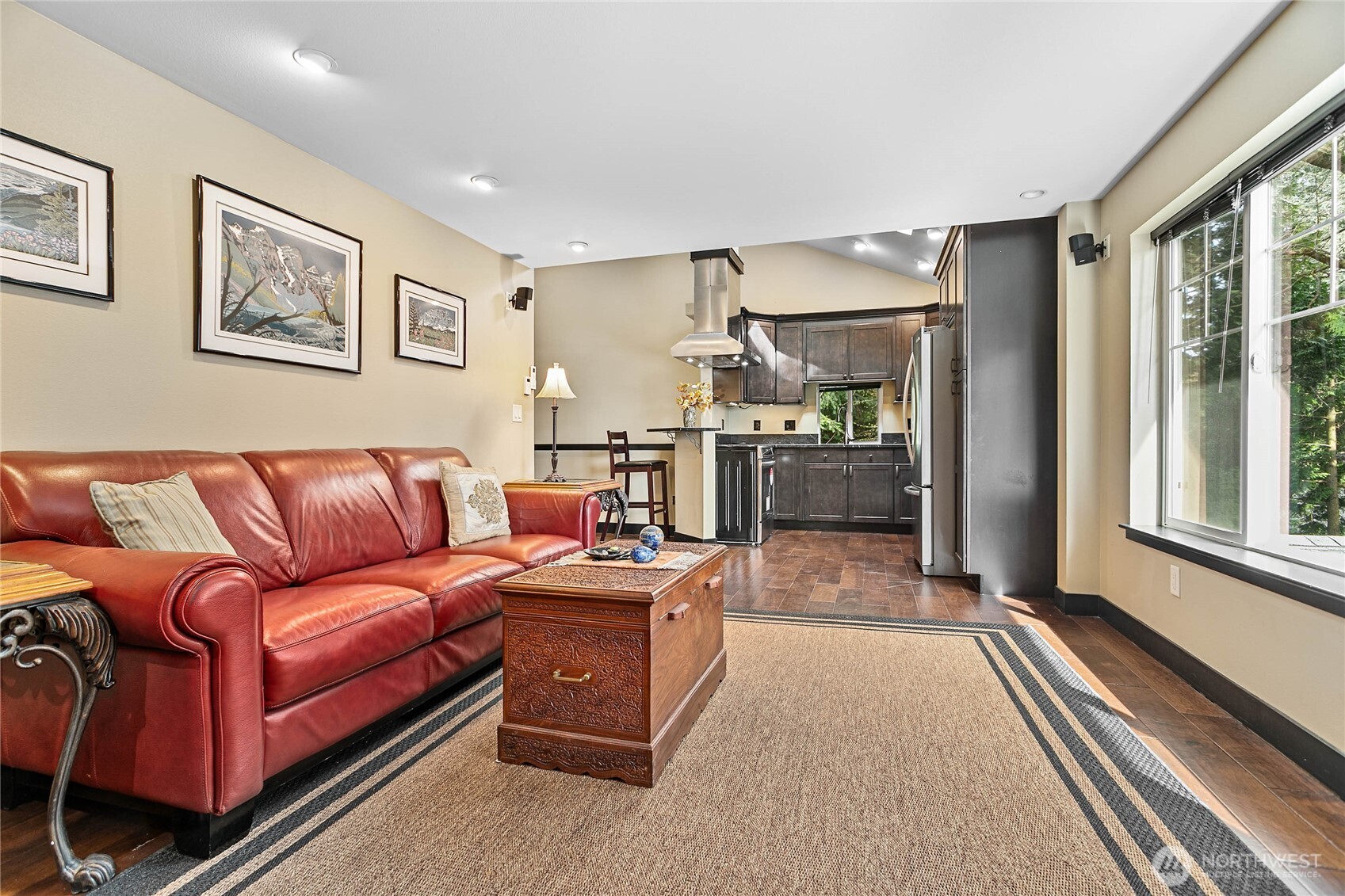 1082 West Smith Road Bellingham, WA 98226 - Photo 8 of 38 a living room with furniture a large window and stainless steel appliances