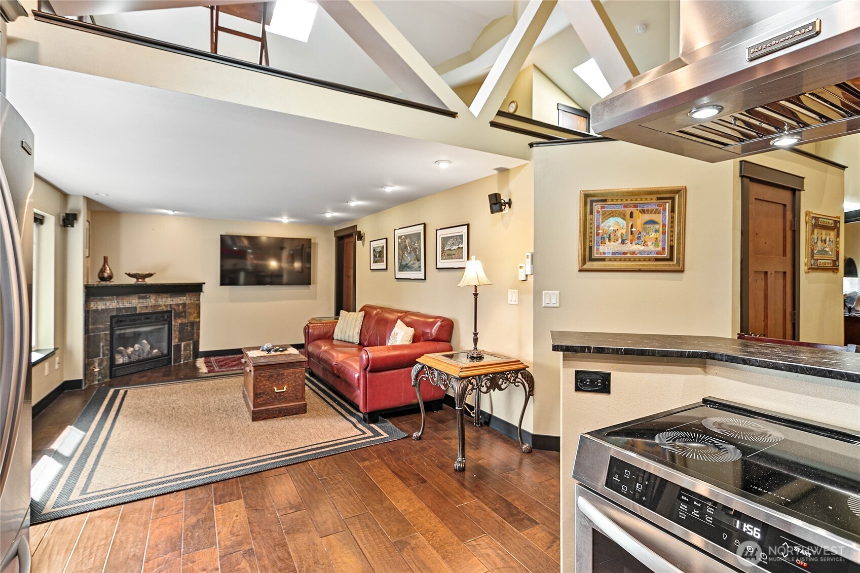 1082 West Smith Road Bellingham, WA 98226 - Photo 10 of 38 a kitchen with stainless steel appliances granite countertop a stove and cabinets
