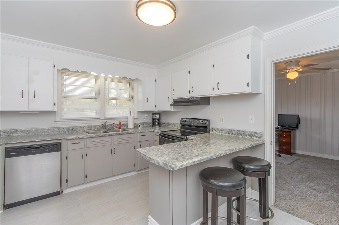 1218 Bolt Drive Anderson, SC 29621 - Photo 13 of 46 Functional kitchen with ample cabinetry and a convenient breakfast bar for casual dining.